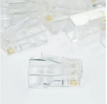 White RJ45 network modular plug with gold-plated three-fork contacts for Ethernet cable termination
