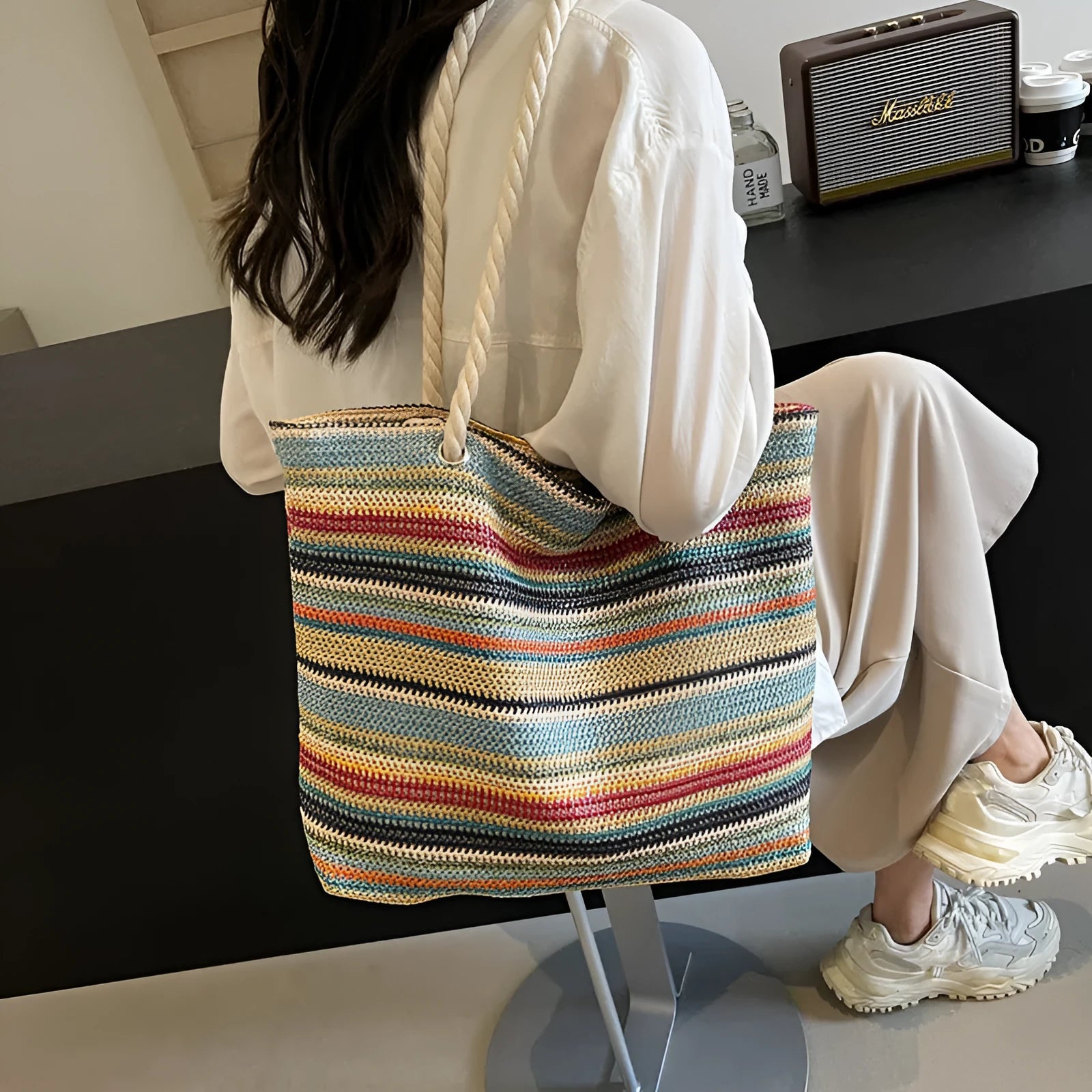 Blue woven nylon shoulder bag with large capacity and a single strap
