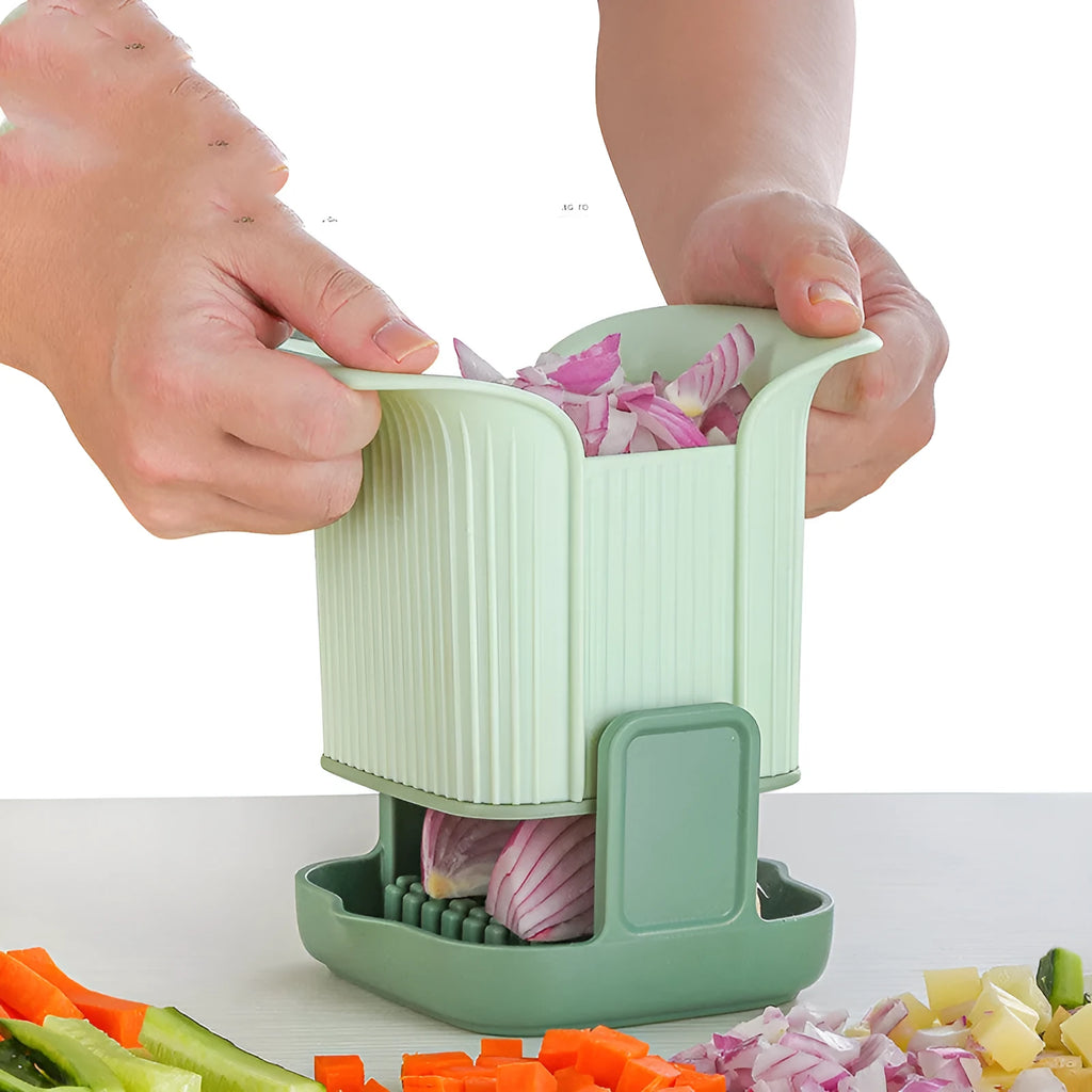 Green multifunctional vegetable chopper with hand pressure mechanism for cutting onions, potatoes, and cucumbers
