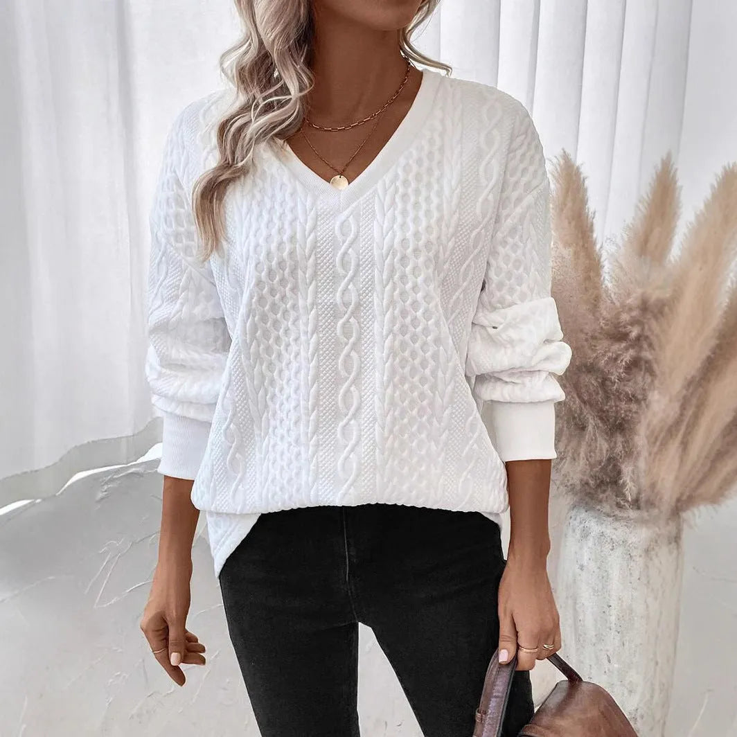 Milk white loose fit long sleeve t-shirt with a subtle 3D pattern on a casual model