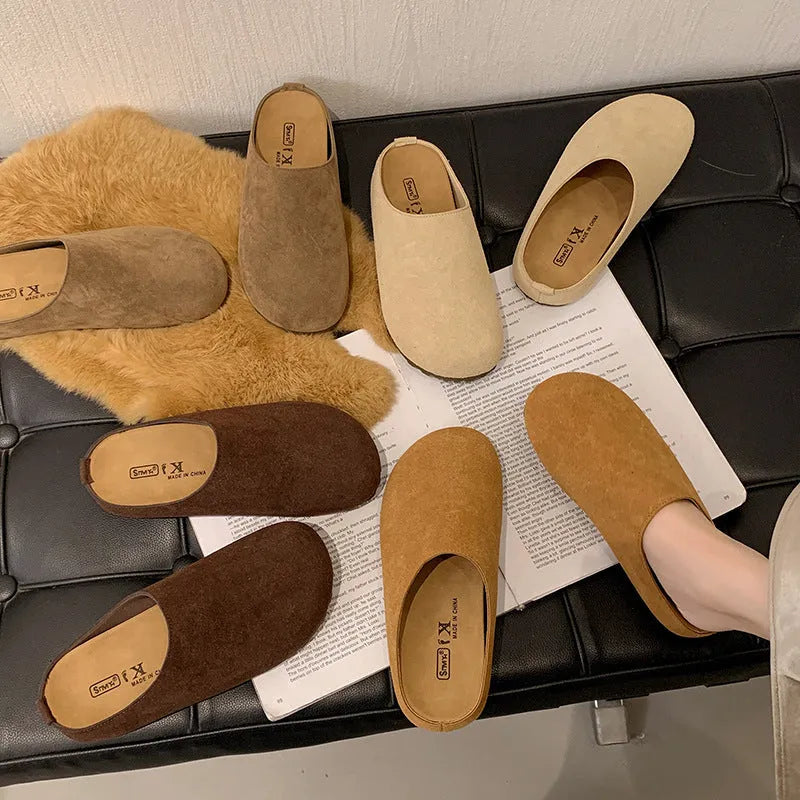 Pair of ugly soft flat Korean style slippers with square toe, shown in apricot colour.