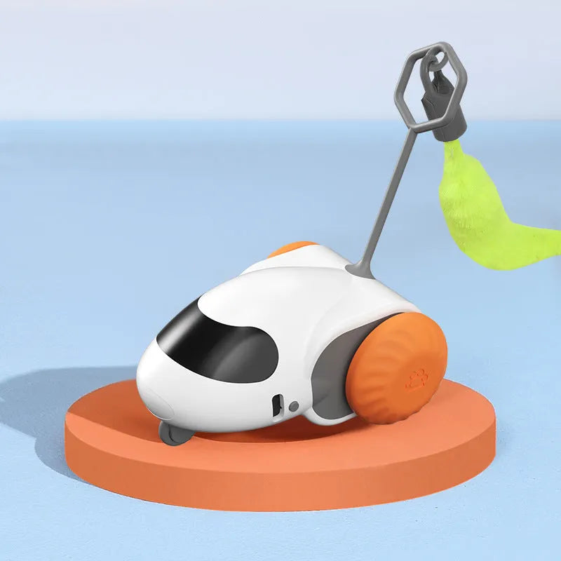 Electric cat toy in Light Gray Blue on a wooden floor, ABS construction, Type-C charging port visible