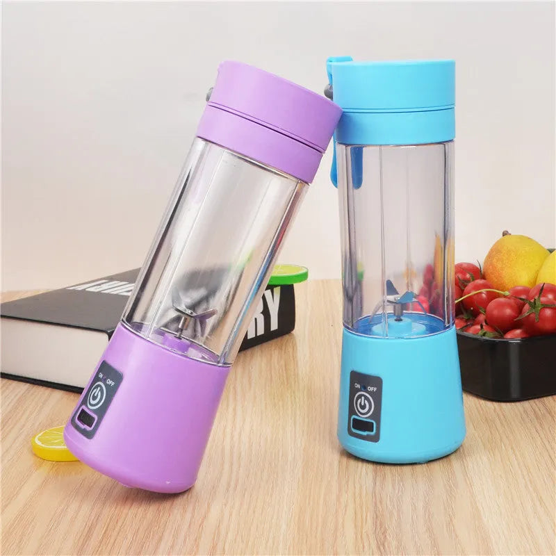 Mini USB electric citrus juicer in pink with stainless steel 304 blade and portage rope