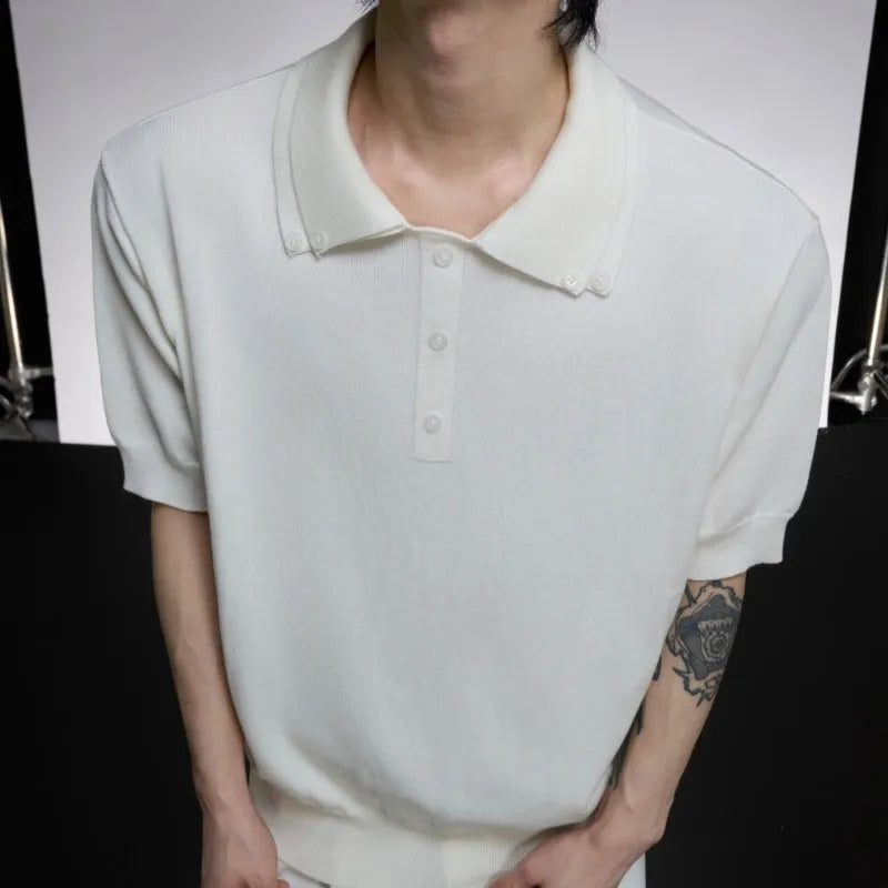 Men's loose fit short sleeve shirt with a lapel collar in grey, hanging on a hanger.