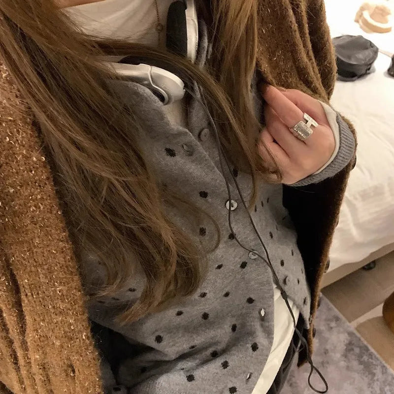 Women's grey knitted cardigan with crochet flower details, loose fit, long sleeves