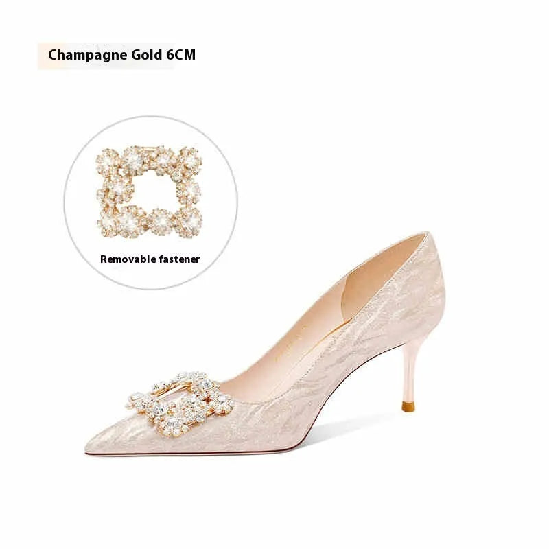Champagne gold pointed toe stiletto high heels with rhinestone decoration on the upper.