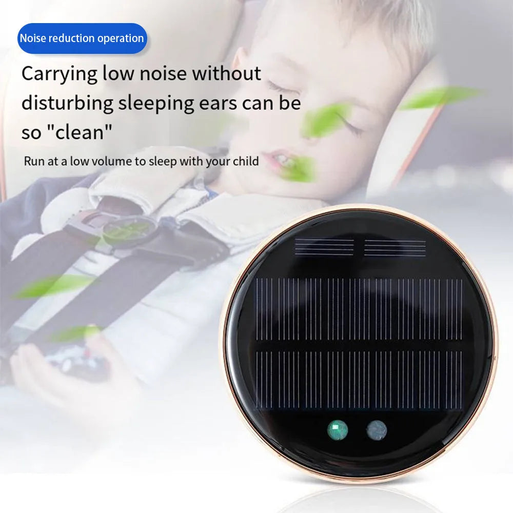 Black solar-powered car air humidifier mounted on a car air vent