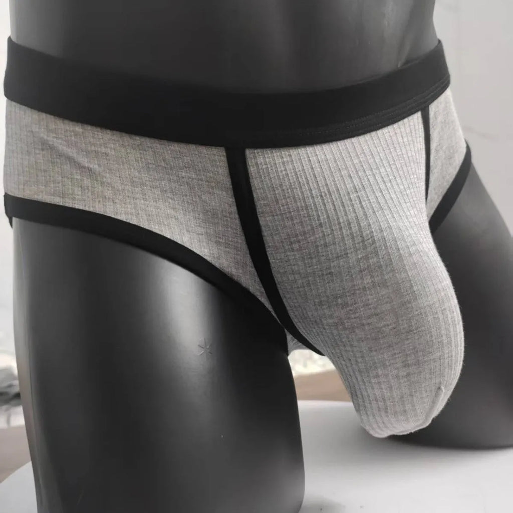 Men's triangle breathable knitted viscose U-shaped big bag underwear in solid colour shown on model