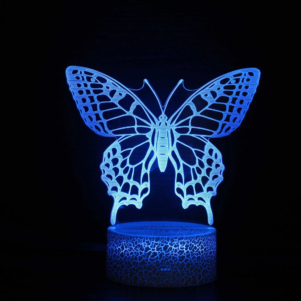 Small colourful acrylic 3D USB table lamp with touch control and crack base design on a desk.