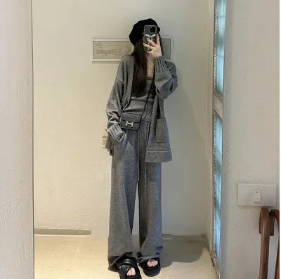 Women's light brown wool-blend knit cardigan vest and loose trousers three-piece set laid flat