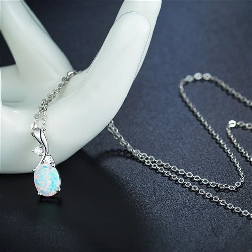 Water drop shaped opal pendant necklace on adjustable O-shaped alloy chain in rose gold finish