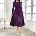 Purple women's long sleeve round neck pullover dress with ruffle detail on a mid-waist.