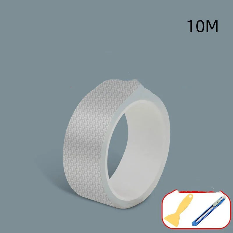 Roll of clear carbon fibre anti-collision film with scraper and utility knife for car door edges