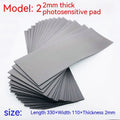 Black and grey plastic light-sensitive seal mat for pottery and calligraphy, 330mm by 110mm.