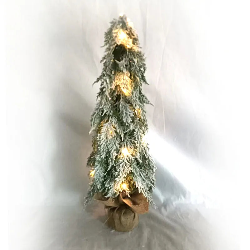 24-inch green PE plastic Christmas tree with lights and snow spray decoration on desktop