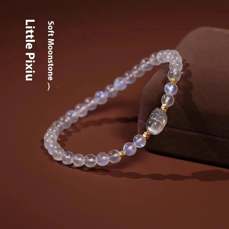 Moonstone women's bracelet with blue light effect and national-style animal motif design