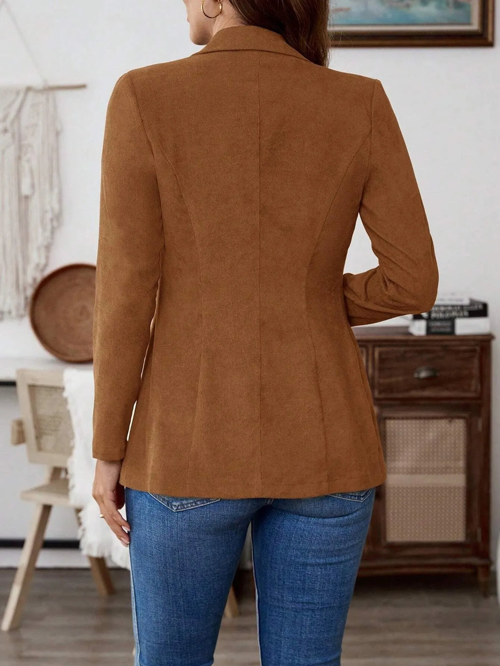 Brown men's single-breasted lapel collar coat with long sleeves on hanger
