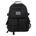 Soft nylon student backpack with computer compartment and three-dimensional pockets in black colour