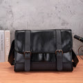 Black Korean-style anti-theft men's backpack made of pu leather with external sewing thread design.