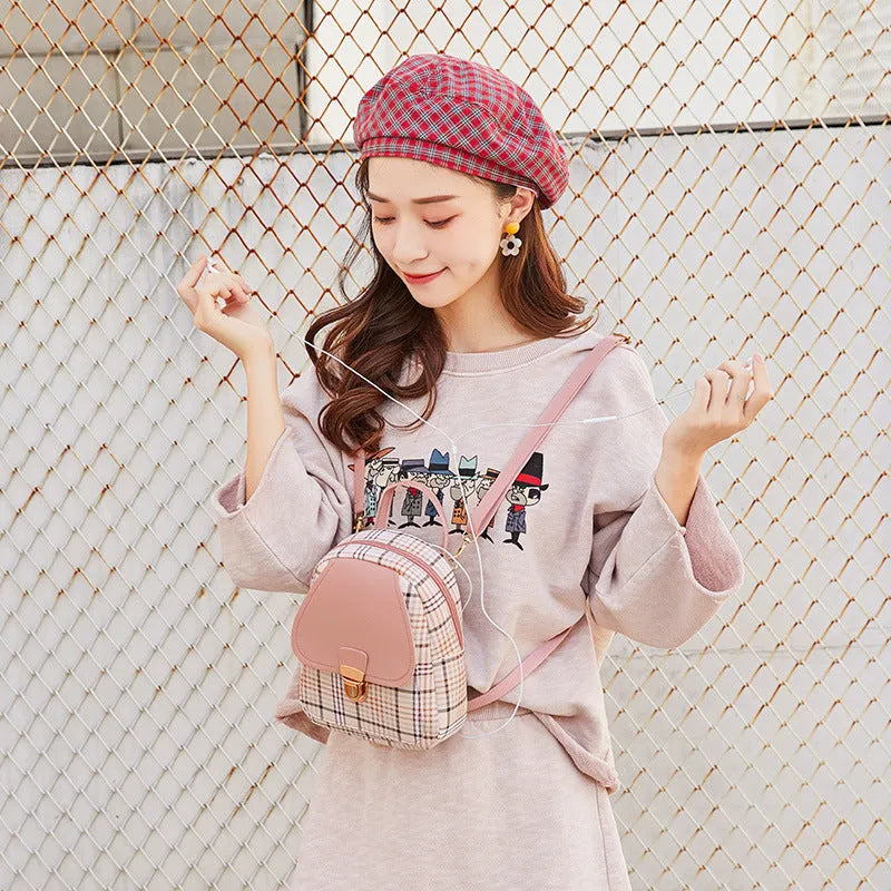 One shoulder diagonal phone bag in PU leather available in black, blue, brown, pink, and red colours.