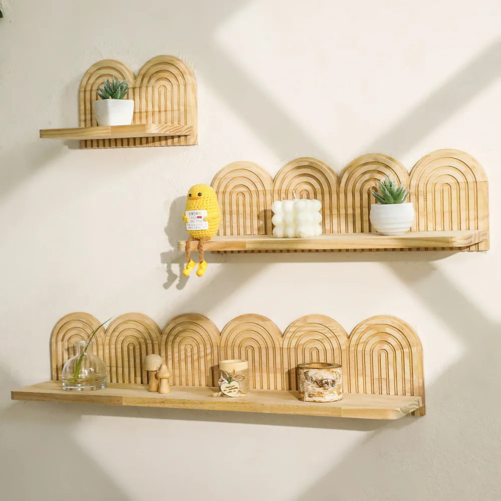 Multi-layer solid wood wall flower pot storage rack hanging on a white wall with indoor plants