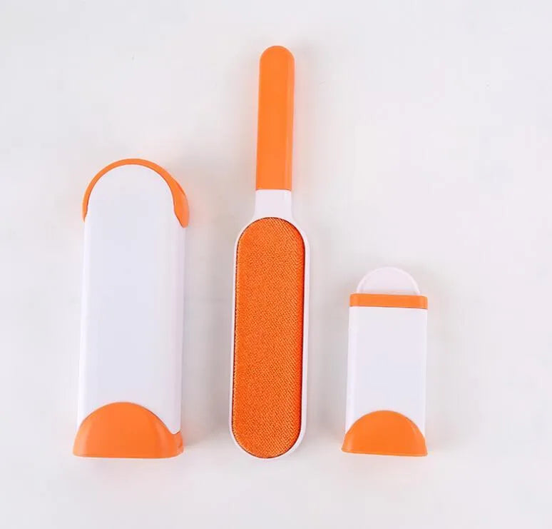 Blue reusable pet hair removal comb with a double-sided sticky brush head and a matching self-cleaning base.