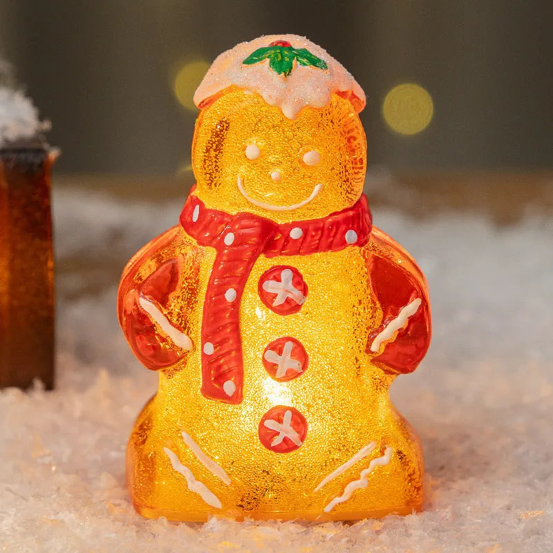 Glowing gingerbread man Christmas ornament with LED lights and red scarf
