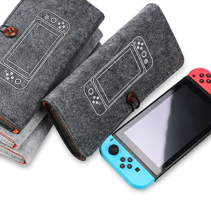 Black felt pouch for Nintendo Switch open to show console compartment and game card slots