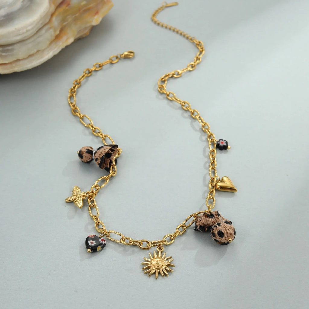 Women's stainless steel necklace with leopard pendant and love heart flowers, 18K gold electroplated geometric design
