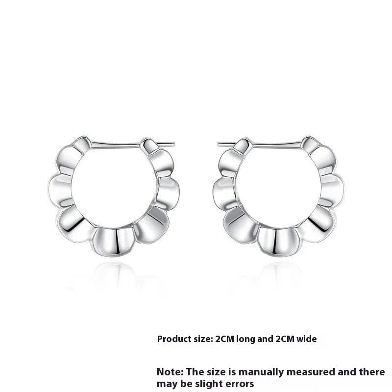 Sterling silver geometric hoop earrings with electroplated finish and circular retro design