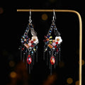 Retro bohemian hand-woven long drop earrings with artificial crystal diamond shape in amethyst colour