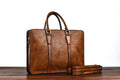 Men's 14-inch vegetable tanned leather handbag in horizontal square design
