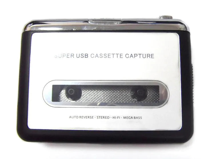 Cassette to MP3 converter device with USB cable on a desk next to a cassette tape