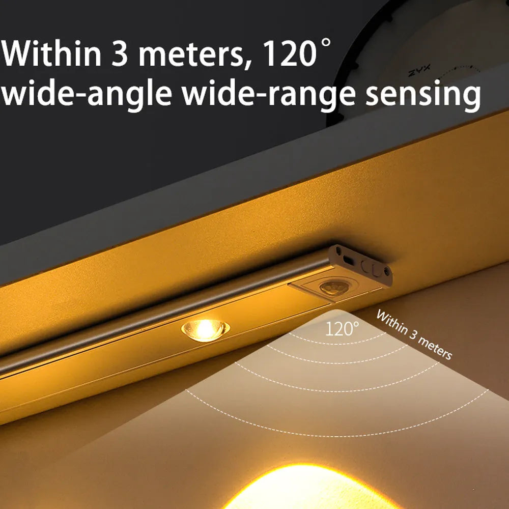 Ultra-thin USB LED night light with motion sensor in silver, aluminium body, 20 cm length, mounted inside a kitchen cabinet