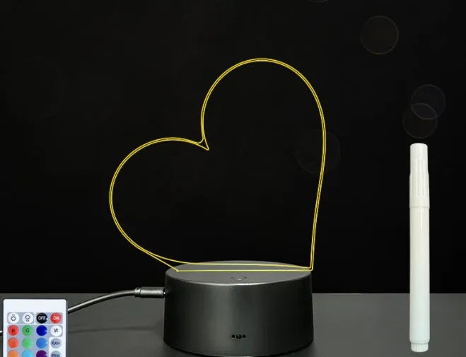3D acrylic message board with LED lighting and a stylus pen on its illuminated surface