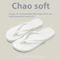 Foldable plastic beach slippers with non-slip sole in black, shown open and folded.