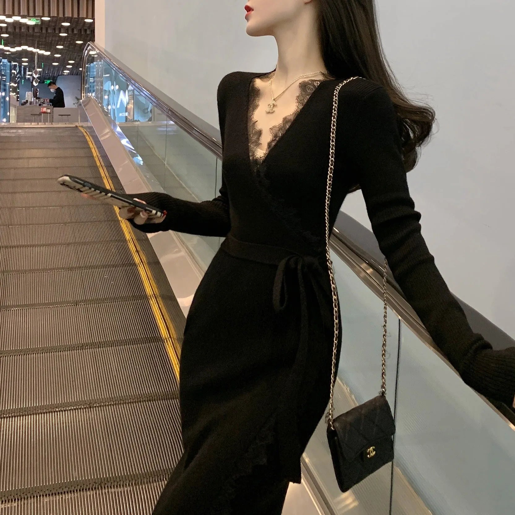 Black women's slim fit princess dress skirt made from polyester, shown on a model.