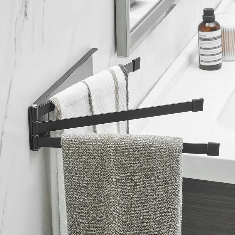 Black folding non-perforated towel bar on tiled bathroom wall, nail-free adhesive installation