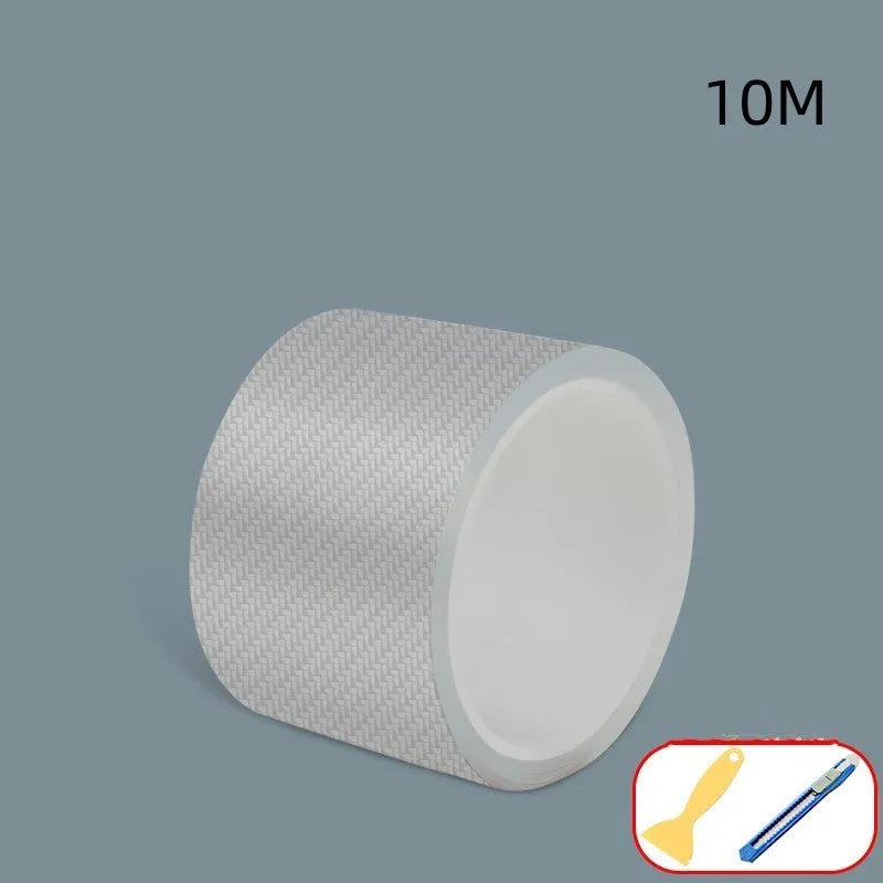 Roll of clear carbon fibre anti-collision film with scraper and utility knife for car door edges