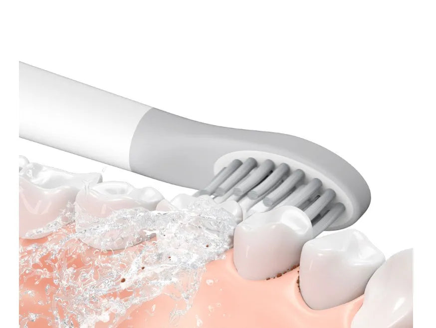 Sonic electric toothbrush in blue with round brushing head and IPX7 waterproof rating