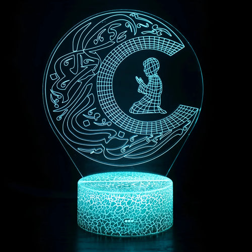 3D small night lamp with touch and remote control showing colourful LED illumination on a bedside table