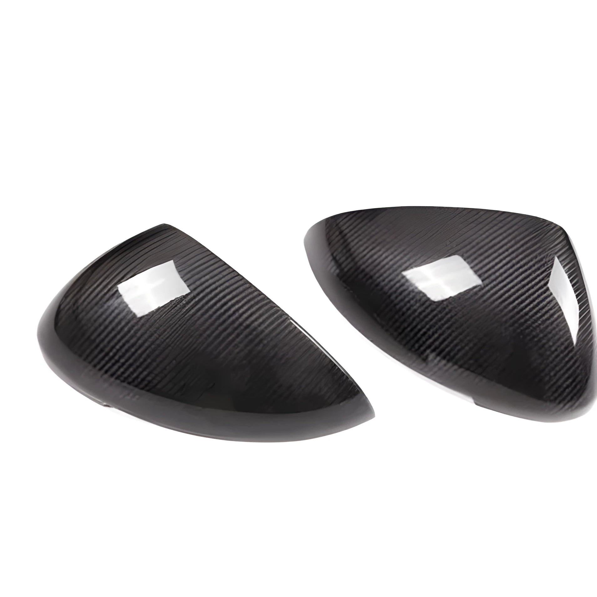 Pair of black true carbon fibre rearview mirror covers for Porsche Macan on a white background.