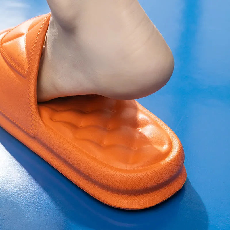Pair of thick EVA bathroom slippers with textured anti-slip sole in a choice of five colours.