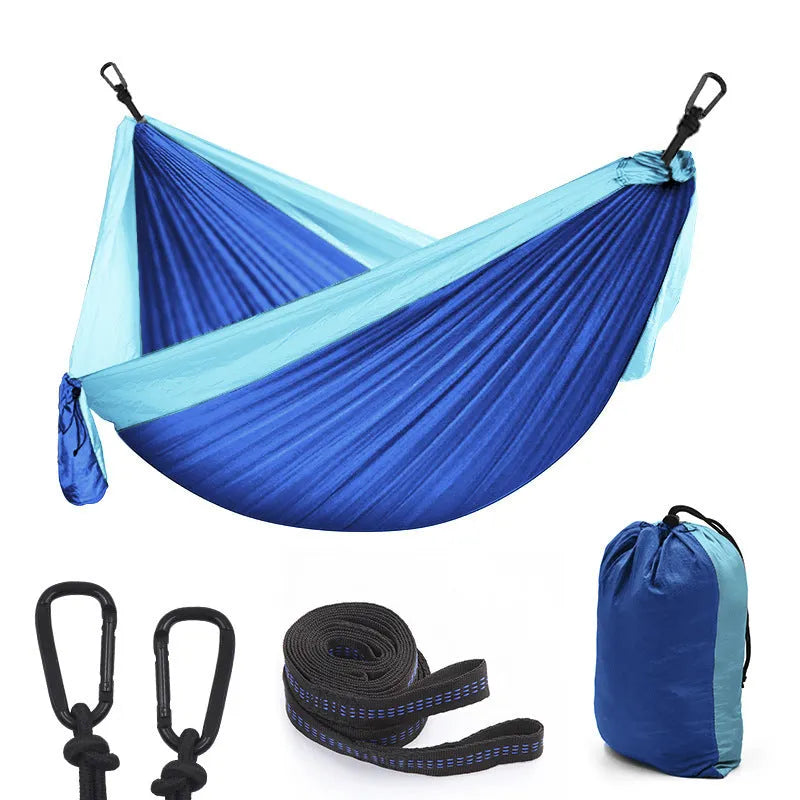 Double parachute hammock 300x200cm in 210T nylon with tree straps on a tree