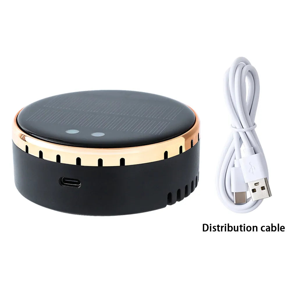 Black solar-powered car air humidifier mounted on a car air vent