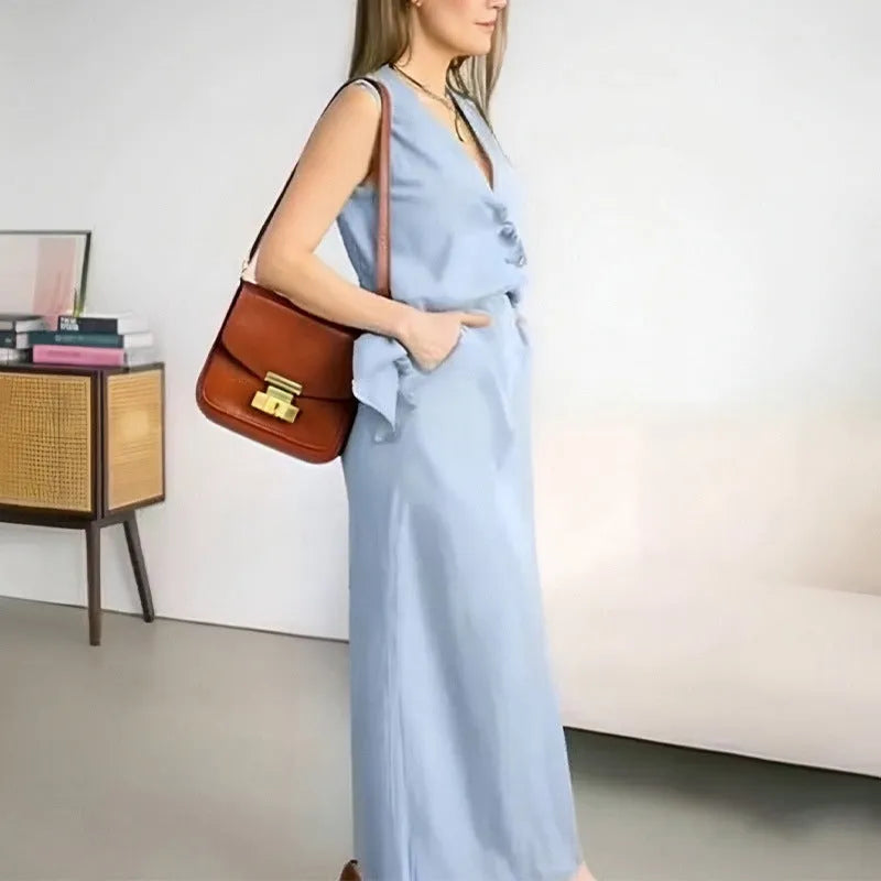 Blue loose-fitting sleeveless vest and long skirt two-piece casual suit set on a model