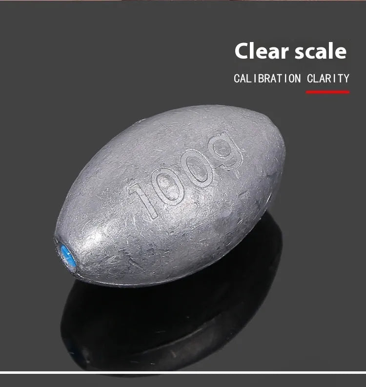 Olive-shaped sea fishing lead sinker with scale pattern texture and plastic core