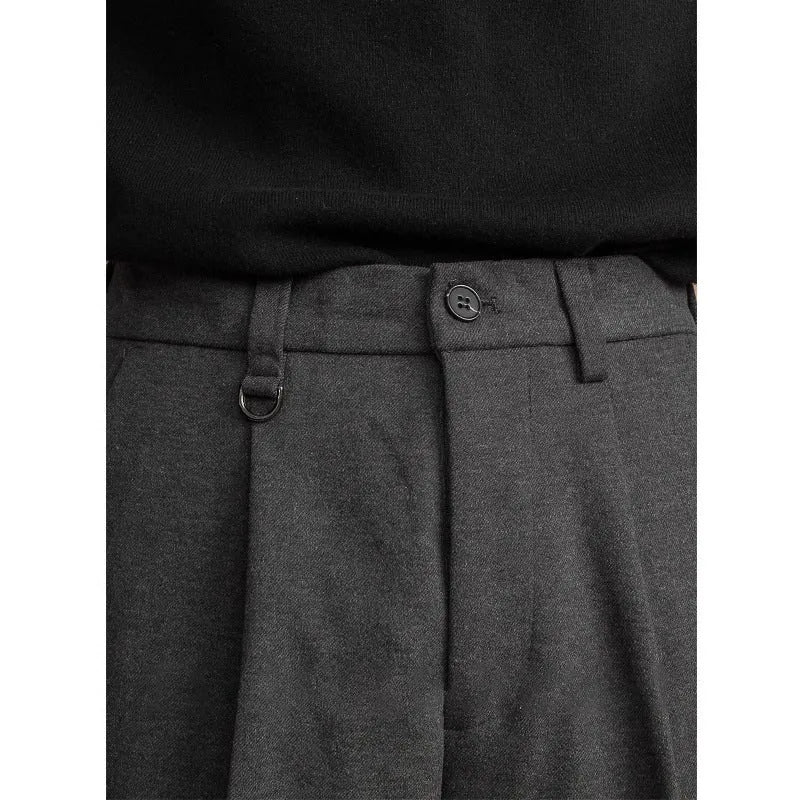 Men's straight leg suit trousers in draped fit, shown in dark grey colour.