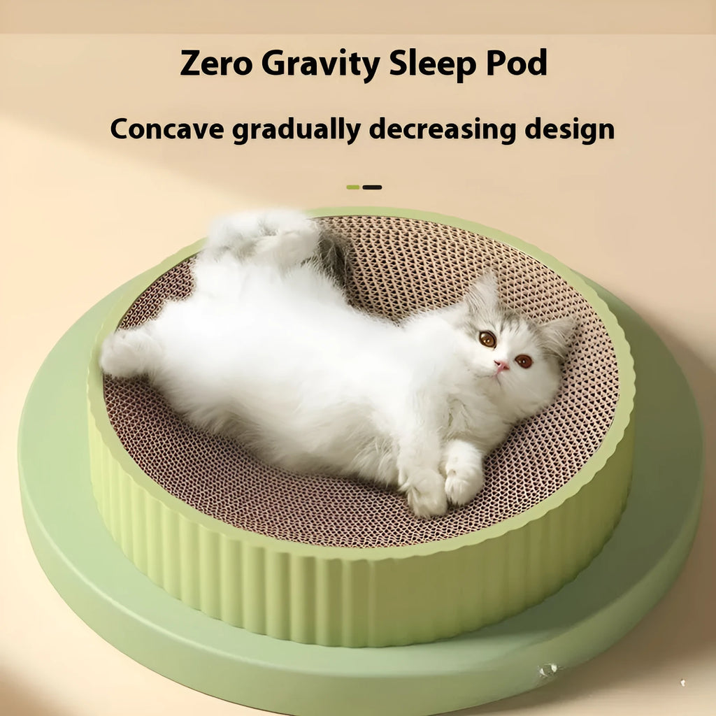 Round green cat scratching board with corrugated cardboard centre measuring 55cm diameter with replacement packs