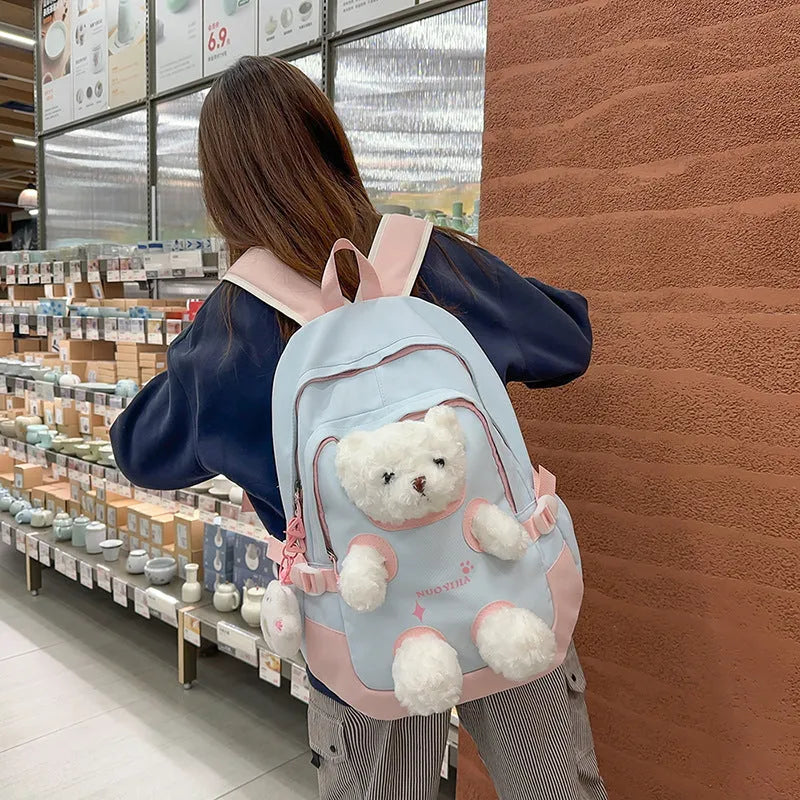 Cute Bear nylon schoolbag with curved shoulder straps, 20-35L capacity, in yellow pink colour